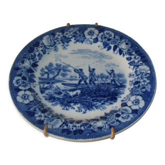 Old plate with hunting decoration