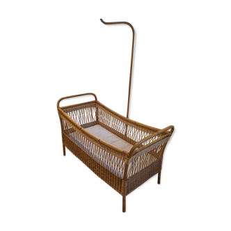 Old rattan cot for baby