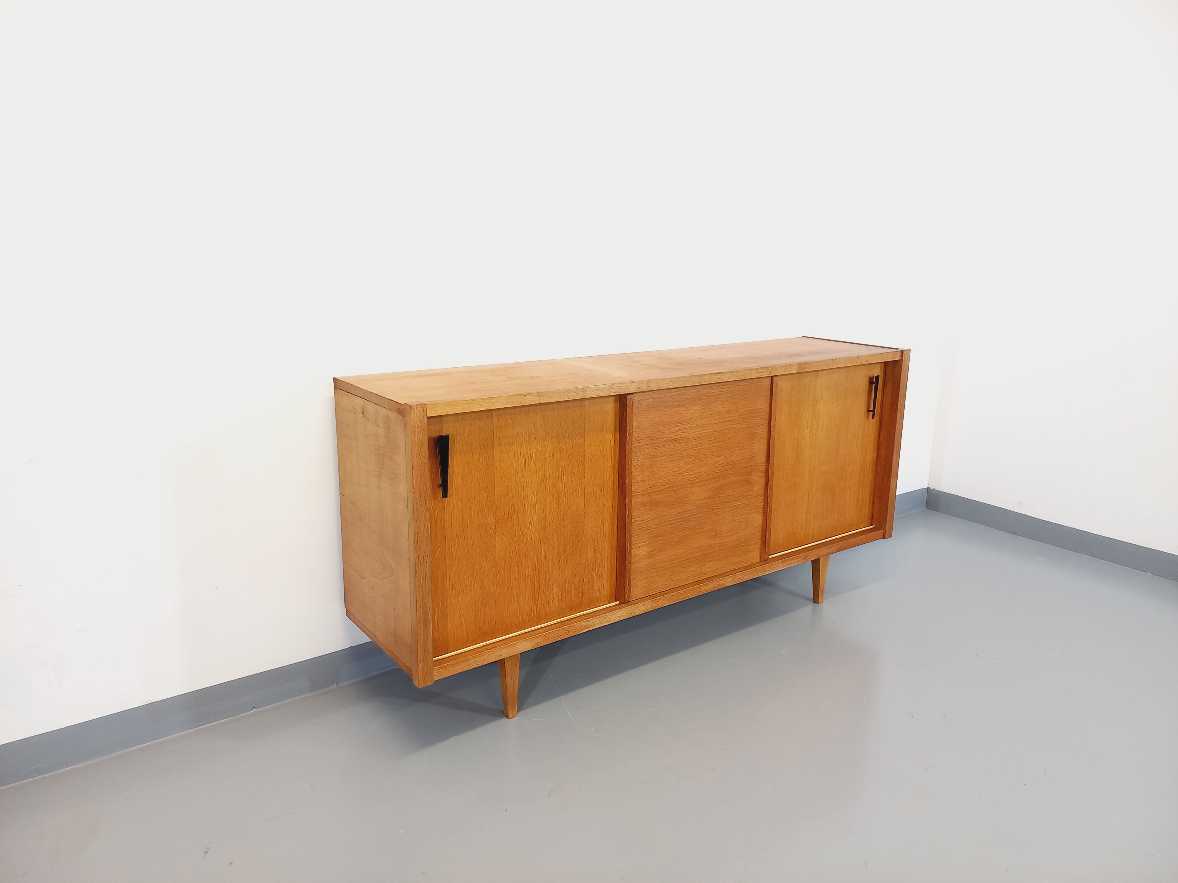 Vintage row in light oak wood from the 60s