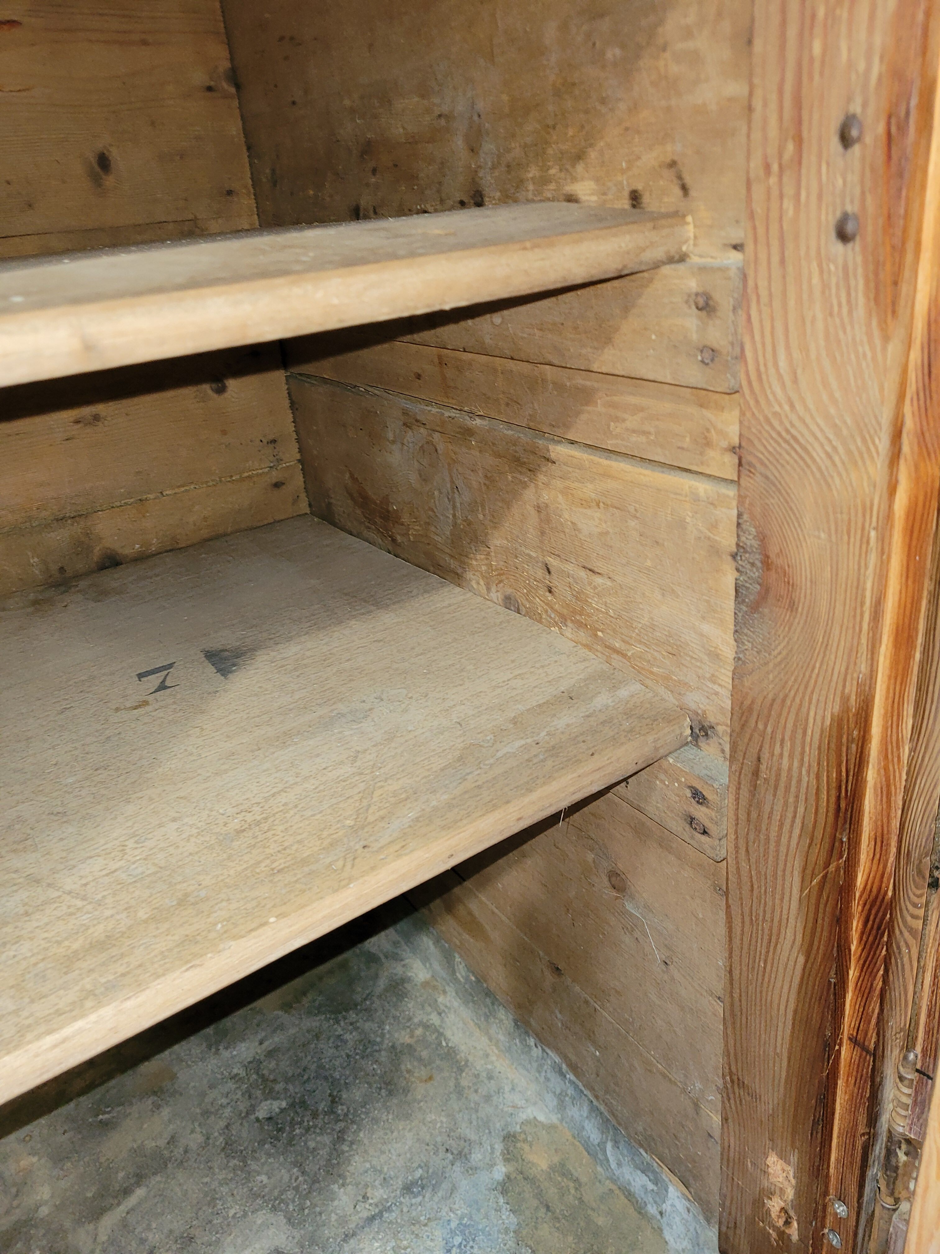 Antique cooler with a door