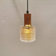 Older Swedish hanging lamp in multi-layered crystal glass with rosewood top and brass ring.