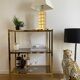 VINTAGE SHELF CONSOLE IN GOLD METAL AND SMOKED GLASS