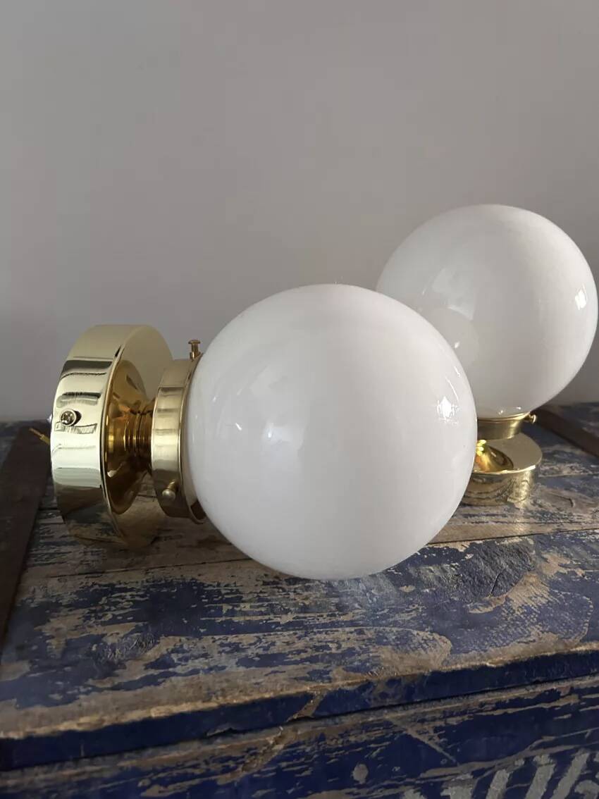 Set of two white opaline ball wall lights