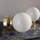 Set of two white opaline ball wall lights