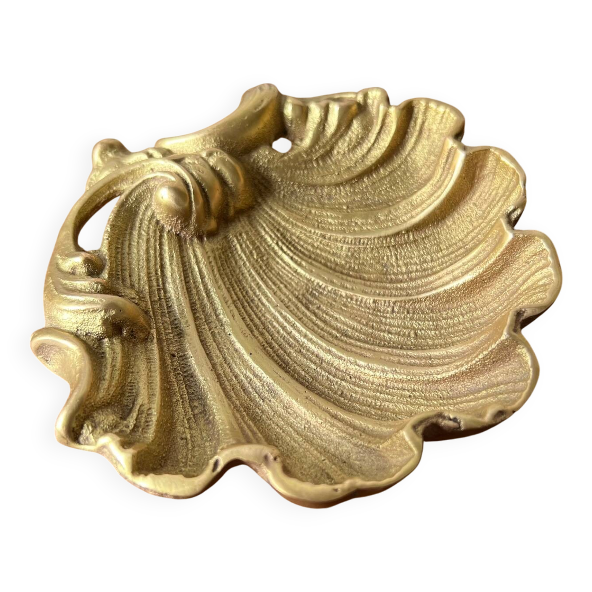 Bronze “shell” pocket emptier