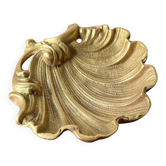 Bronze “shell” pocket emptier