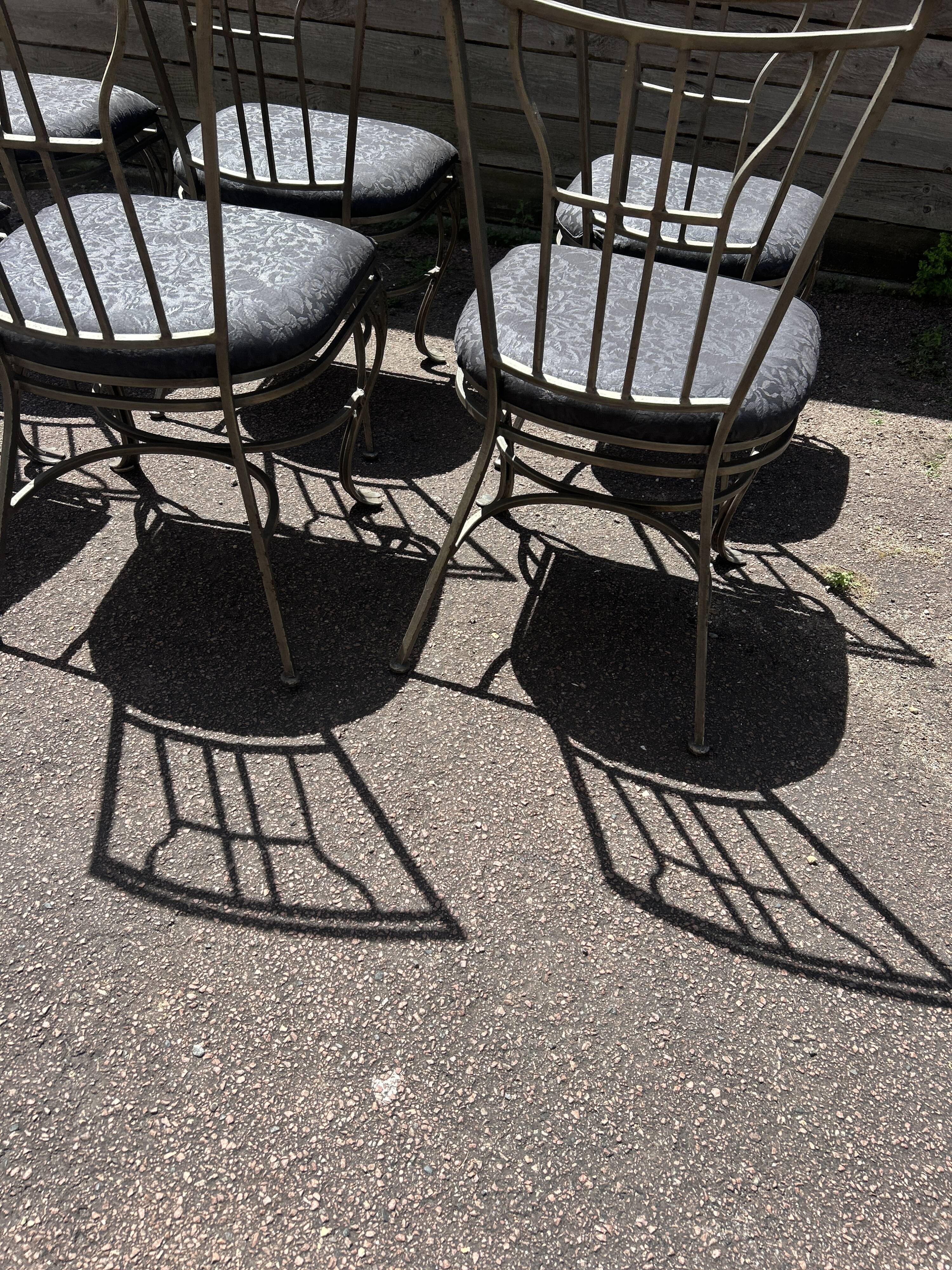 6 wrought iron chairs with fabric seats