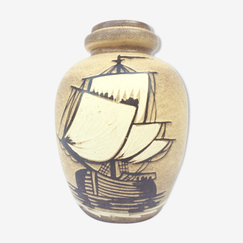 Sandstone vase decorated boat