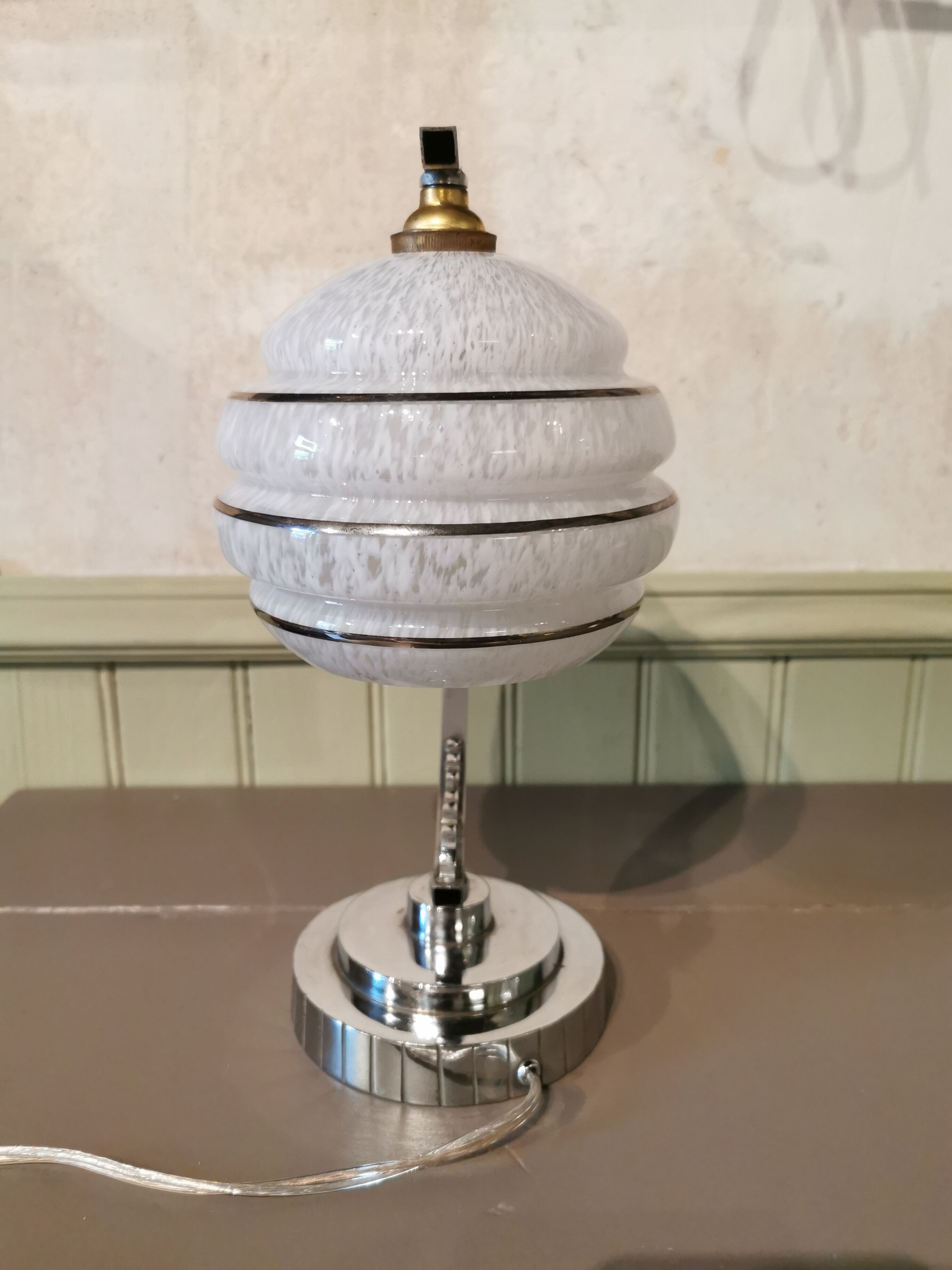 Half-moon chrome art deco lamp