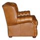 Small Chesterfield leather sofa with a high back.