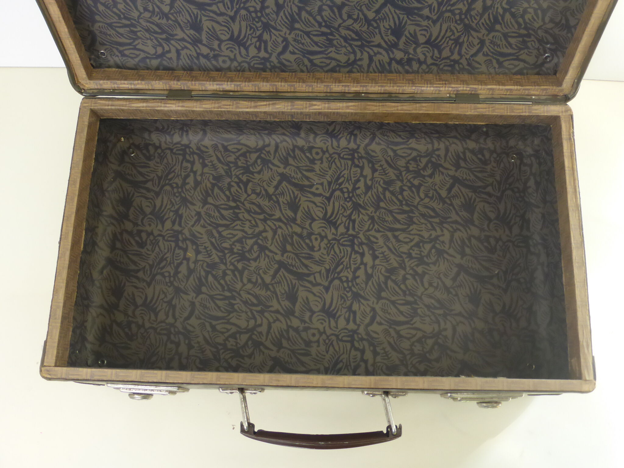 Old brown cardboard suitcase imitating the croco 50s/60s