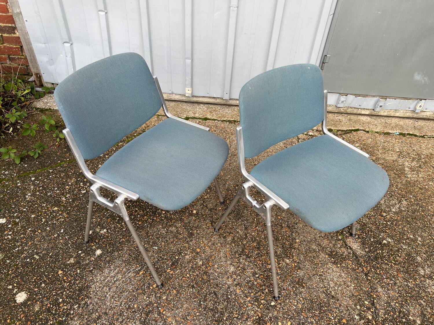 Pair of chairs by G. Piretti for Castelli