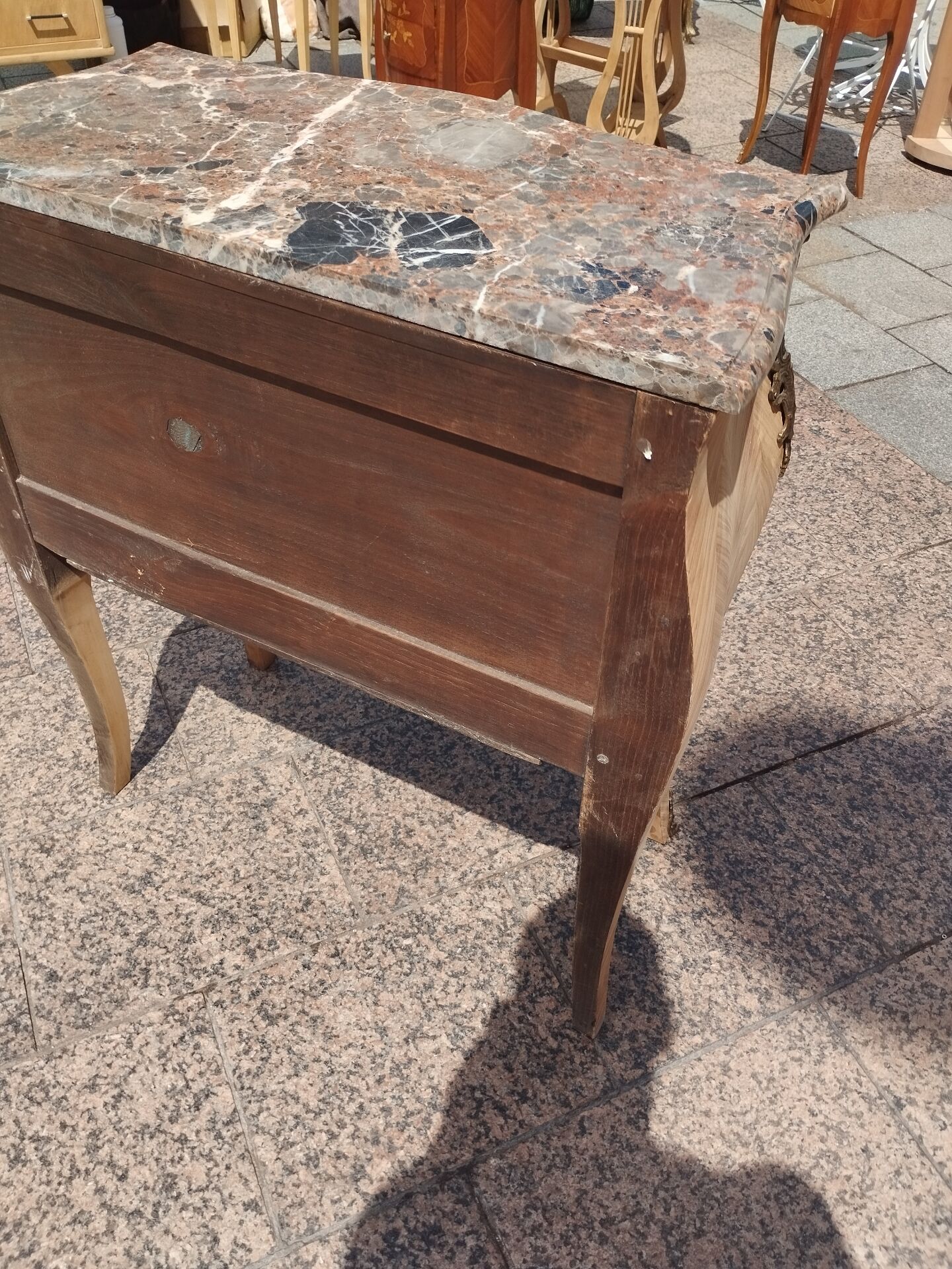 Antique commode in marquetry in the Louis XV style with a marble top.
