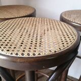 Set of 4 high bistro stools in curved wood and canework.