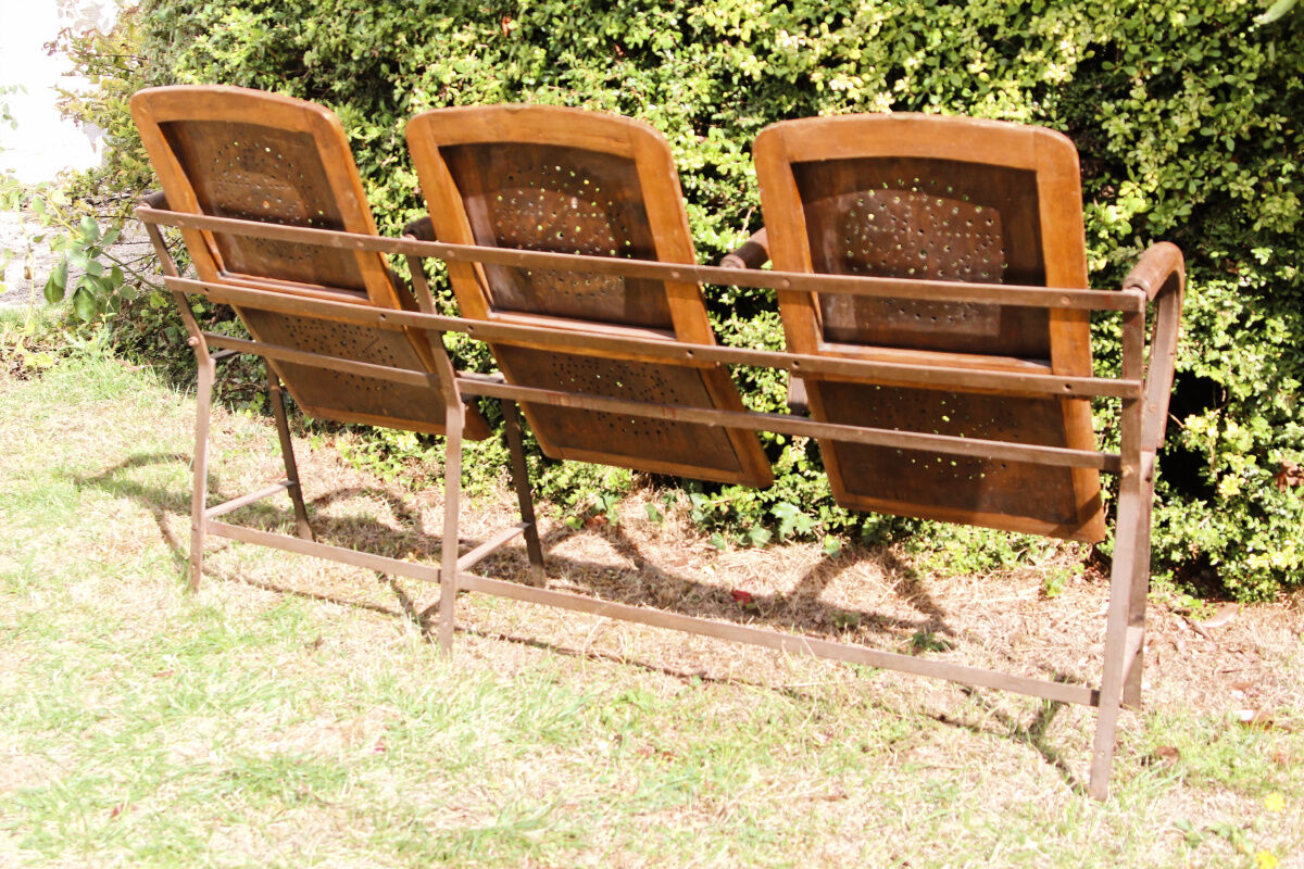 Row of theater folding seats, early twentieth century
