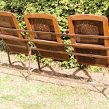 Row of theater folding seats, early twentieth century
