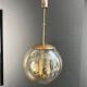 Smoked Glass and Brass Four-Light Suspension Pendant. French Work.