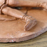 Pair of terracotta medallions