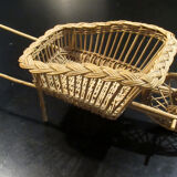 Fun wicker basket, late nineteenth, in the shape of a wheelbarrow.