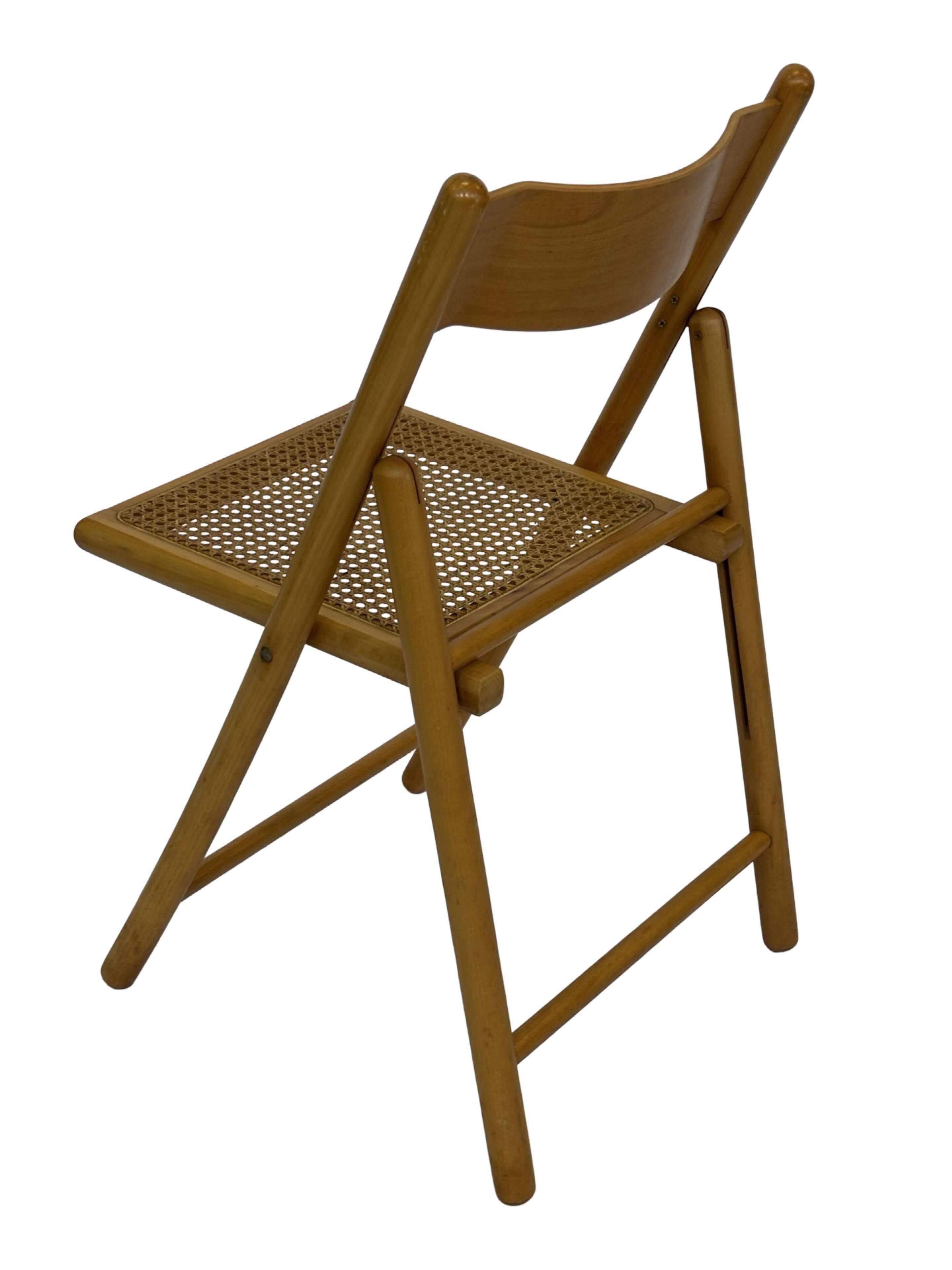 Vintage wooden folding chair with rattan seat 80s minimalist design