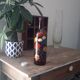 Vintage hand-painted amber glass bottle