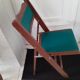 2 folding wooden and skai chairs, 60s