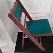 2 folding wooden and skai chairs, 60s
