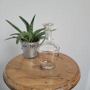 Small glass bottle with gold edges