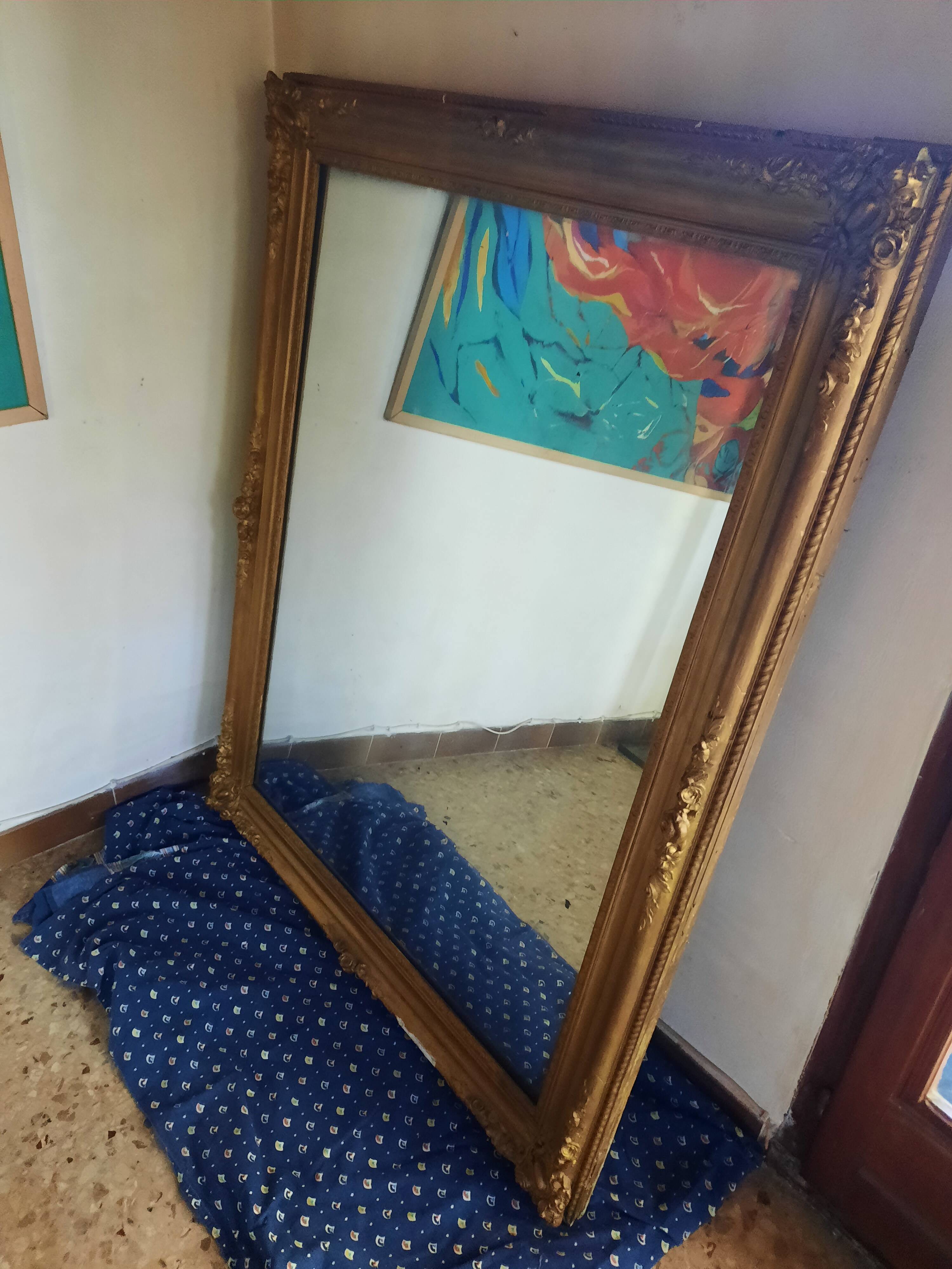 Very large gold mirror