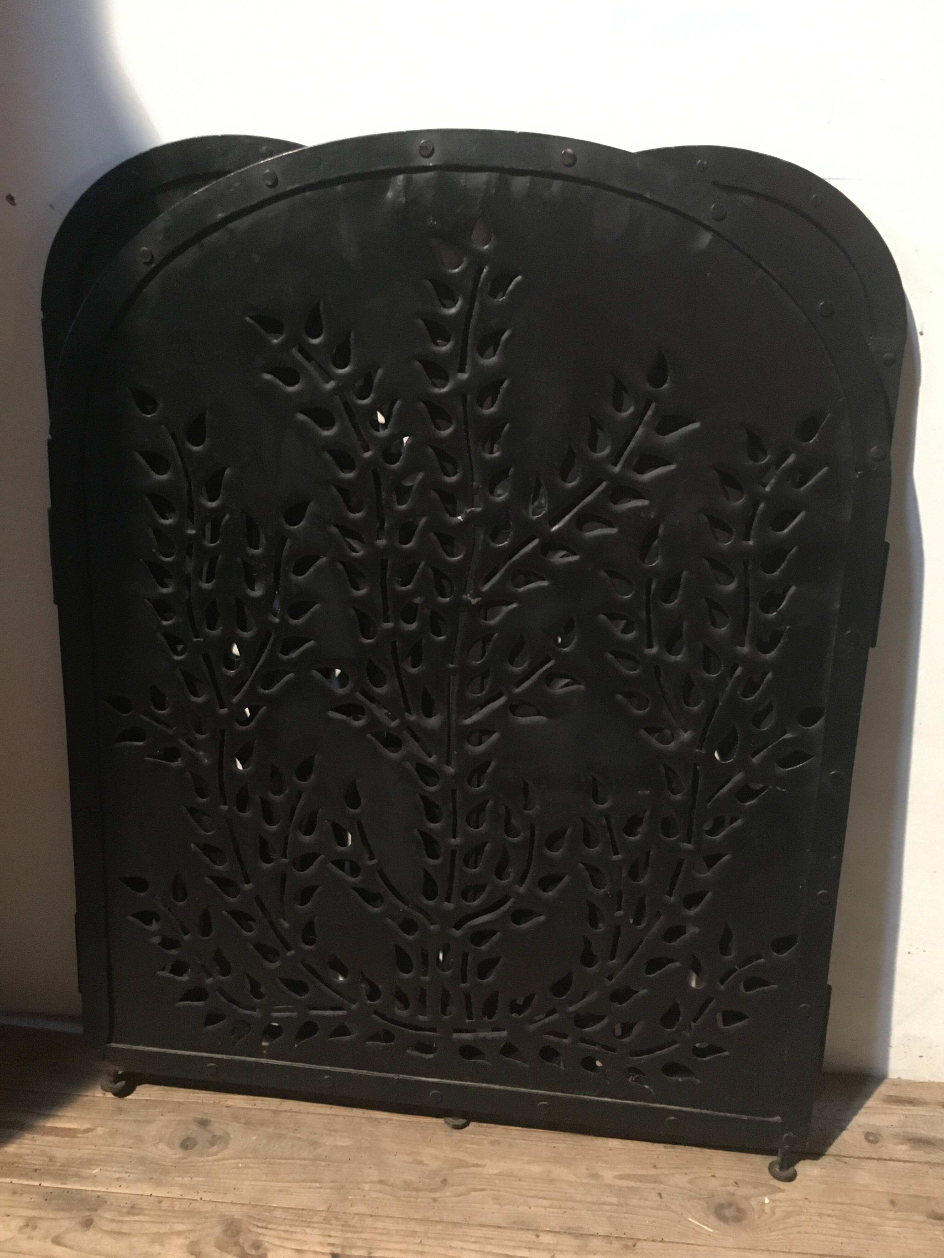 Wrought and cut metal fire screen