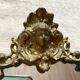 Antique oval brass crest mirror, 41x26 cm
