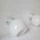 Duo of art deco wall lamps in porcelain and opaline