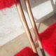 Pair of folding chairs in vintage red moumoute