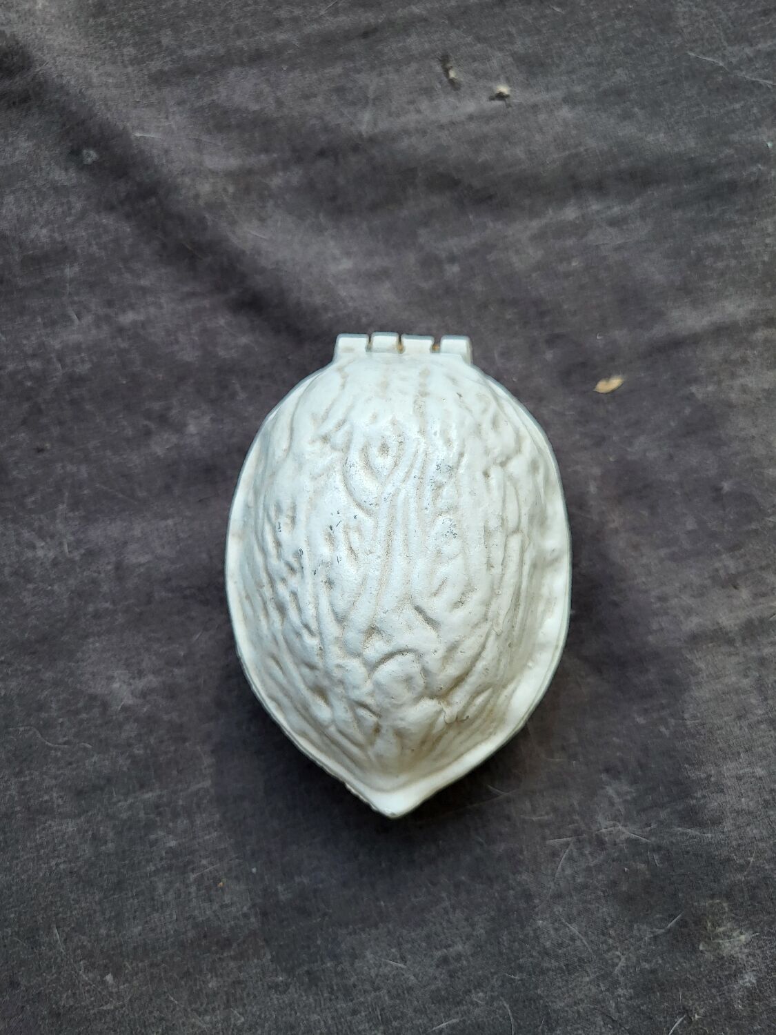 Vintage cast iron nut crate