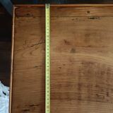 Open wooden bedside table
