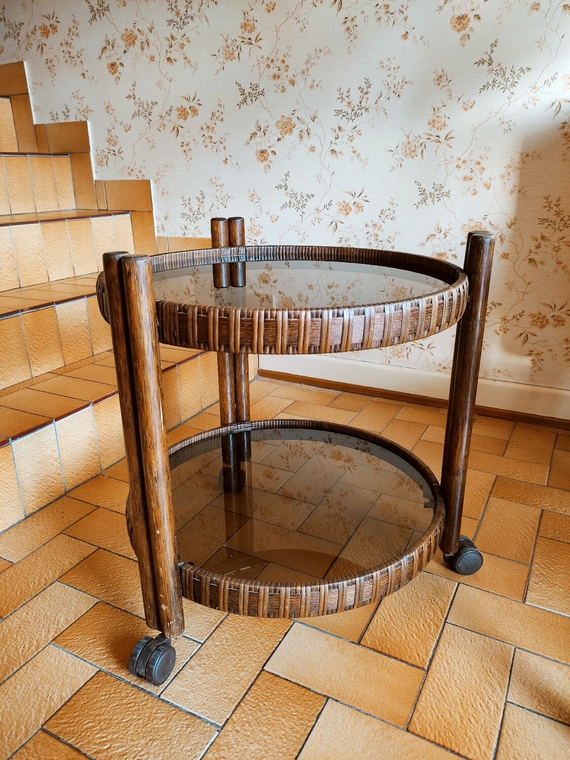 Round rattan bar table on wheels