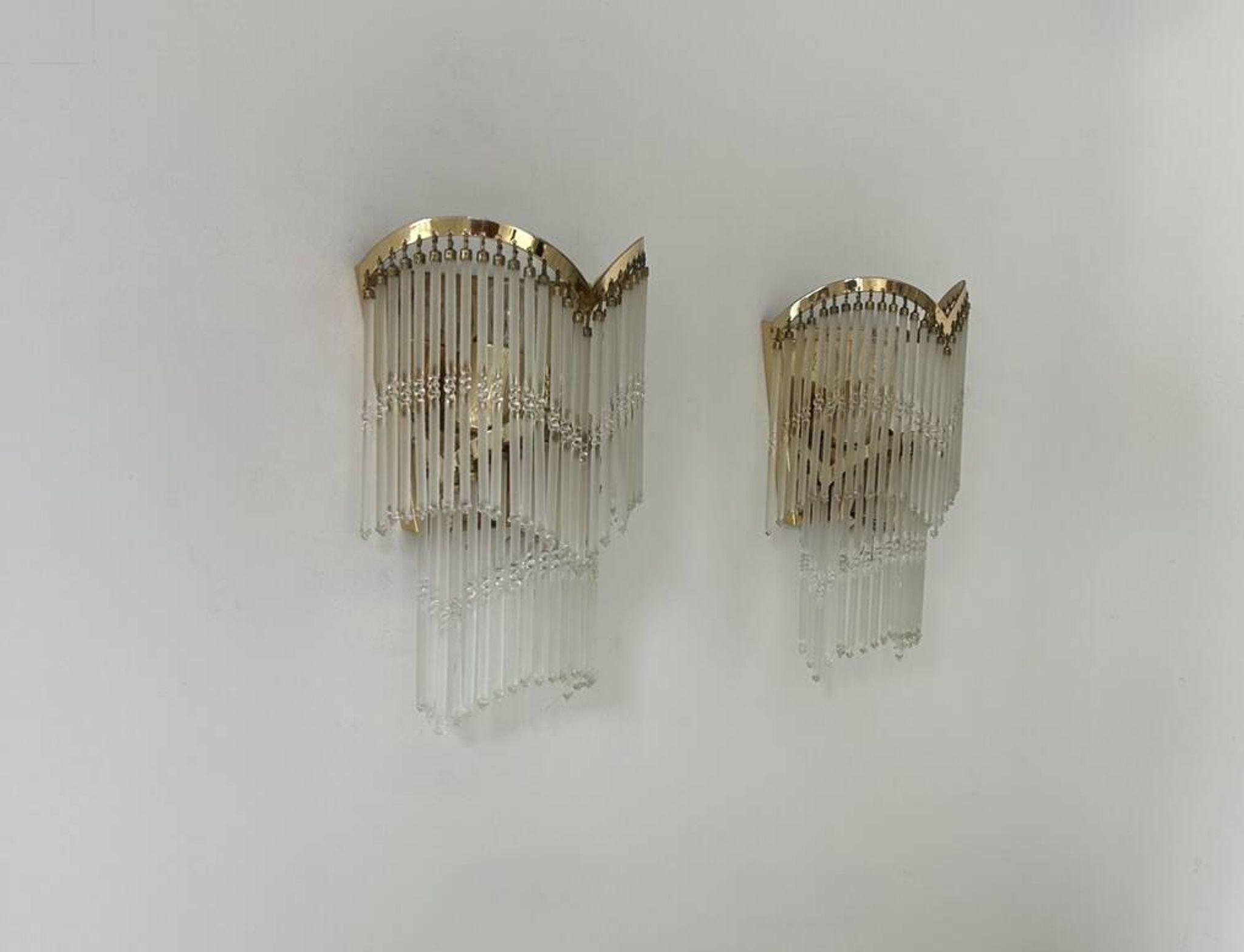 Pair of vintage wall lights, brass and glass pendants, Italy 1970.