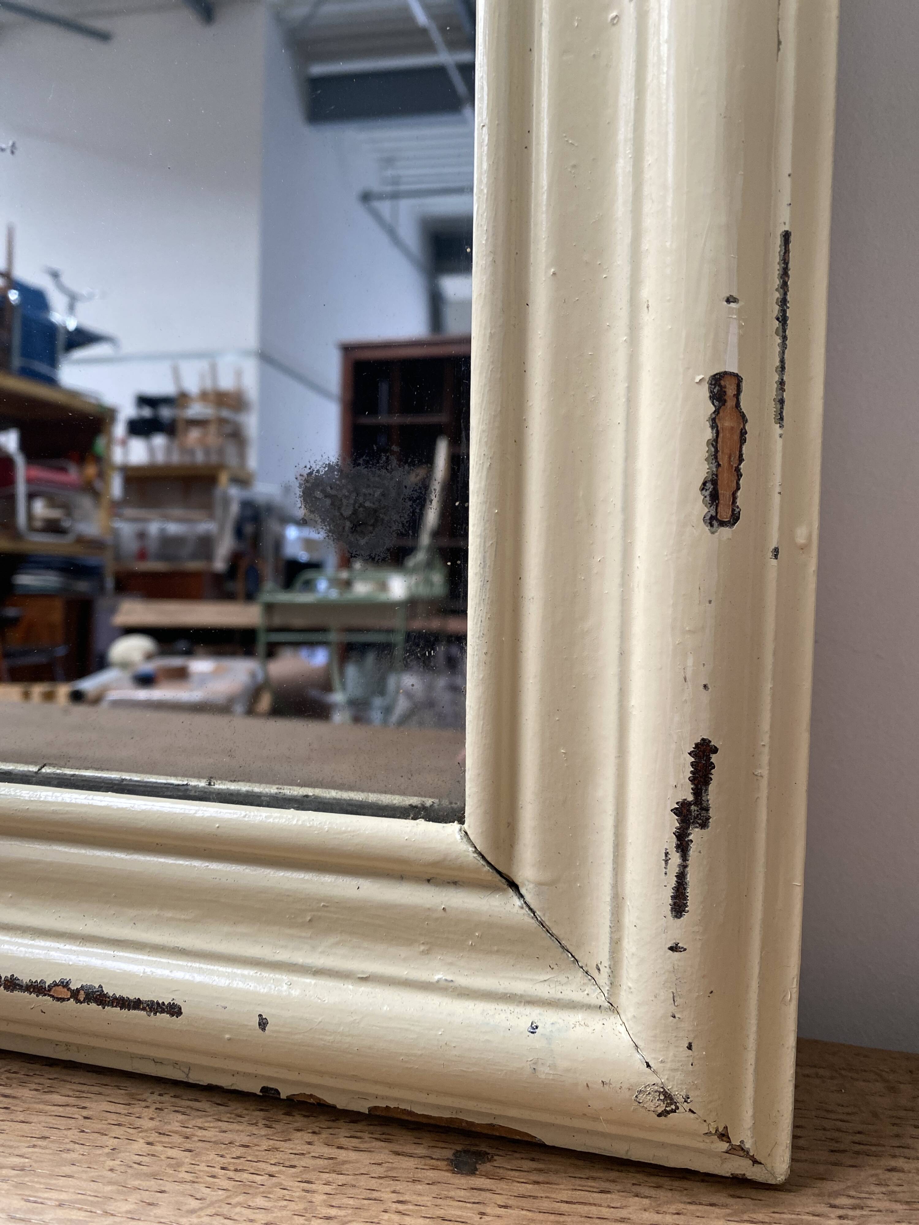 Antique mirror with beige patina