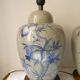 Pair of celadon crackle ceramic lamp bases decorated with flowers.