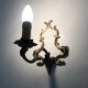 Vintage pair of bronze wall sconces from the 1950s and 60s.