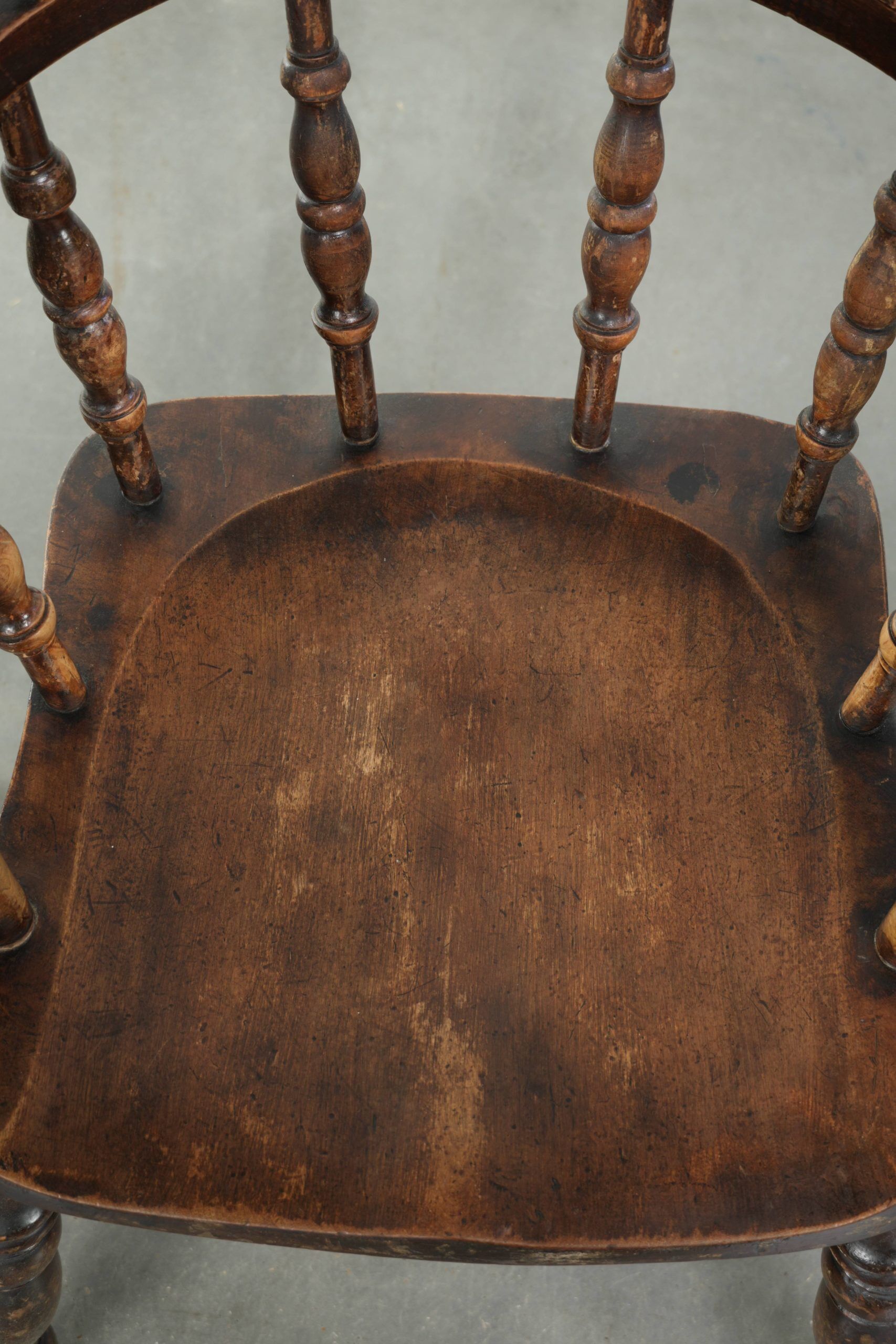 Set of four wooden English antique pub/captain chairs from the 19th century