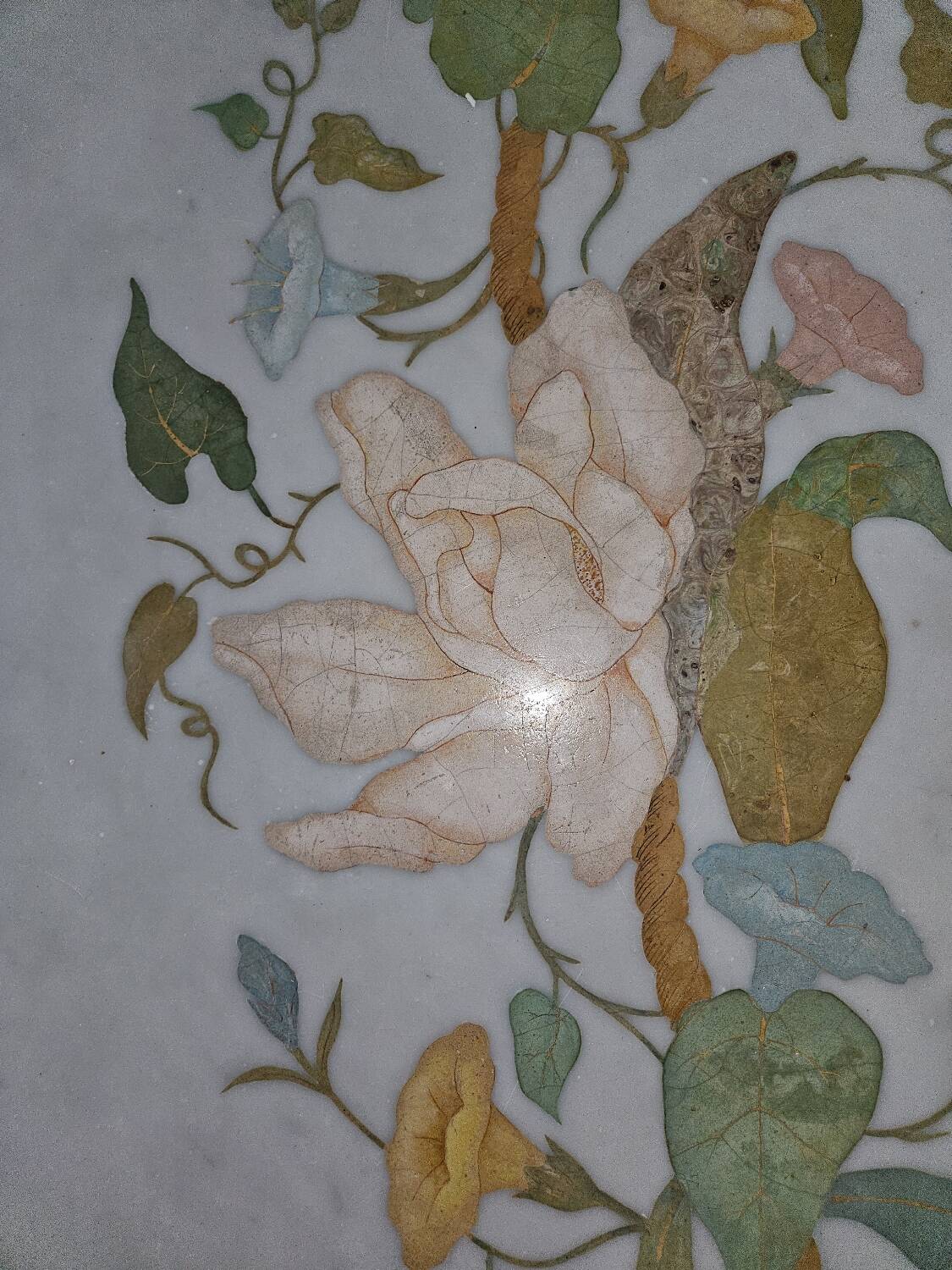 Round table with marble and marquetry