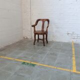 Antique oakwood barber armchair