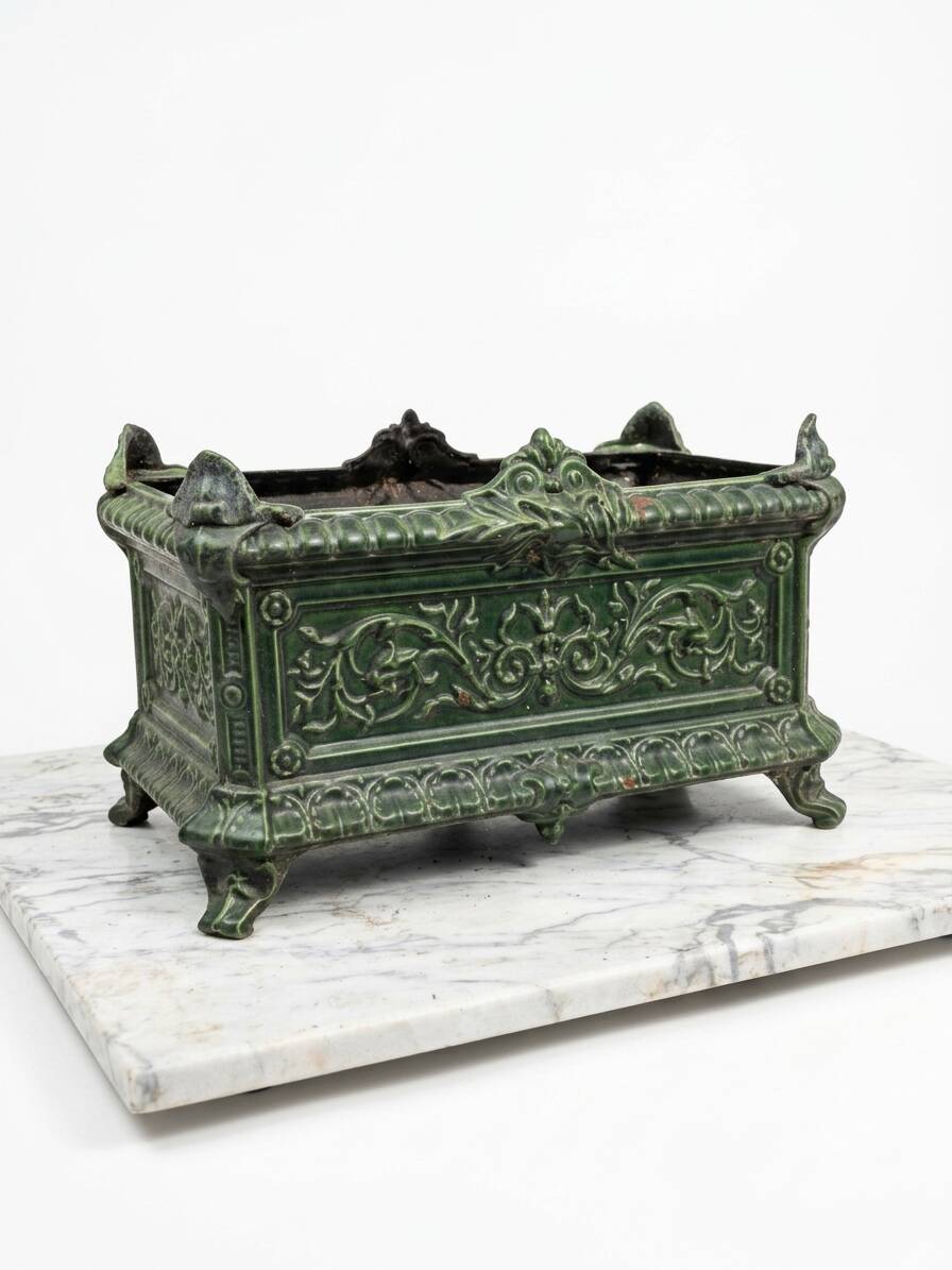 Antique enamelled cast iron planter in the Napoleon III style.