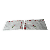pair of monogrammed RB embroidered pillowcases in pink and red