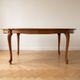 Louis XV table and 4 chairs in wood and marquetry.