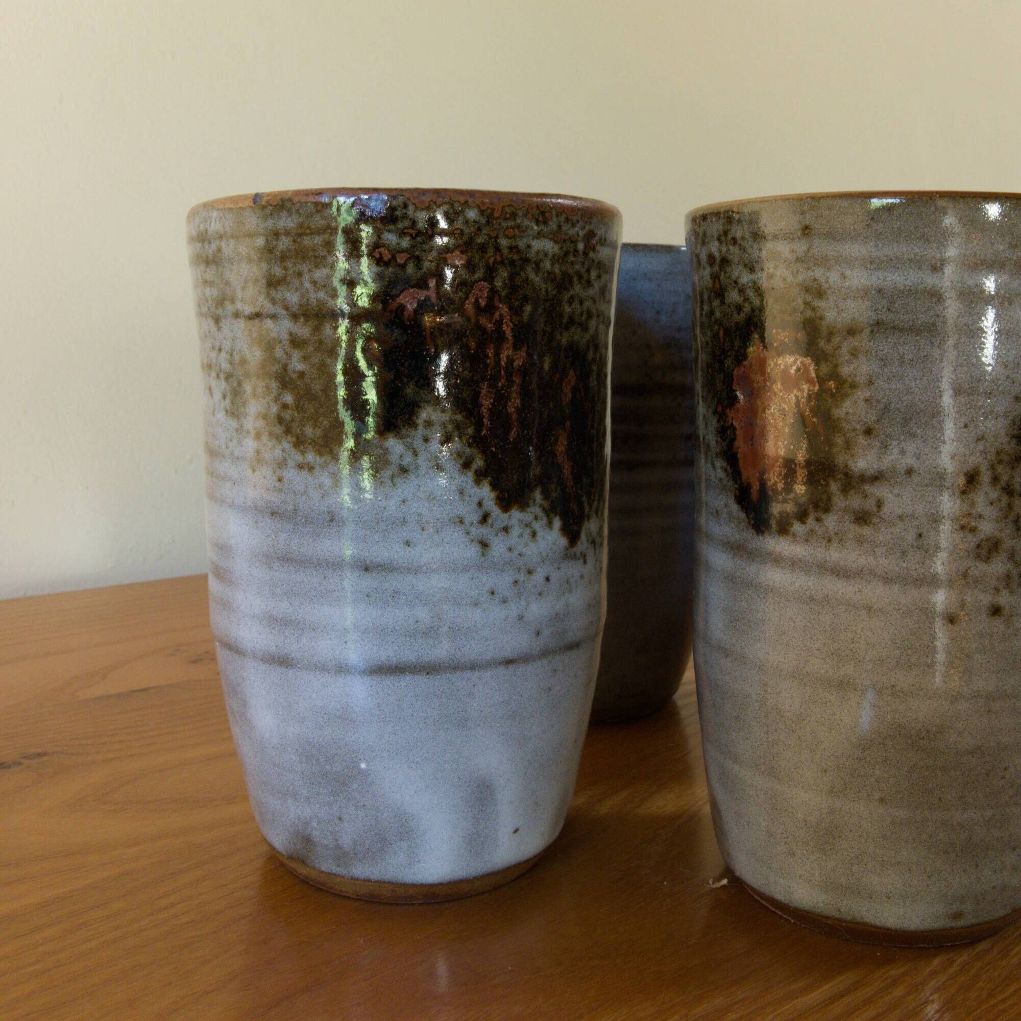Set of 4 glazed stoneware mugs signed by Thierry and Chantal Robert.