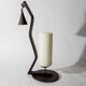 Vintage wrought iron candlestick from the 1960s, zigzag design with removable snuffer.