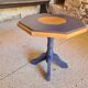 Octagonal wooden coffee table with central leg