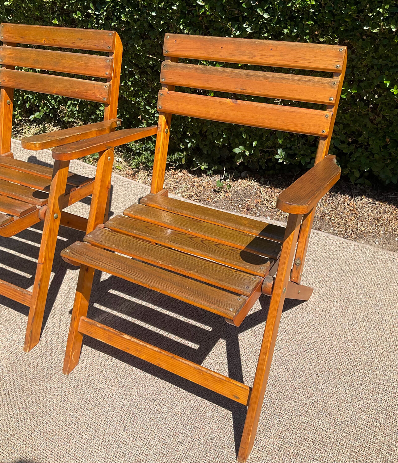Pair of vintage wooden folding armchairs